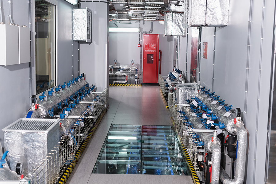 A coolant room with large tanks of cooling fluid for a server room